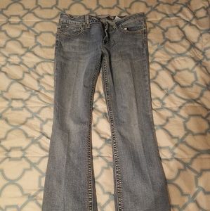 Lighty used Tin Haul low rise jeans.